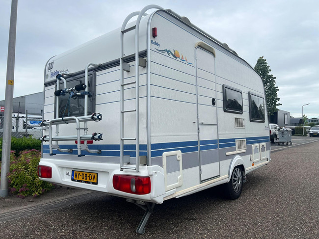 Hobby De Luxe 400 SF | Luifel | Fietsenrek | Mover Half Automaat | Vastbed | Dinette (Treinzit) | Tempo 100 | Schokbrekers