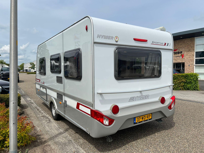 Hymer Sporting 465 | Volautomatische Mover | ZGAN Voortent | Lattenbodem | Ombouwbare Rondzit | Luifel | Fransbed | Fietsenrek foto: 6