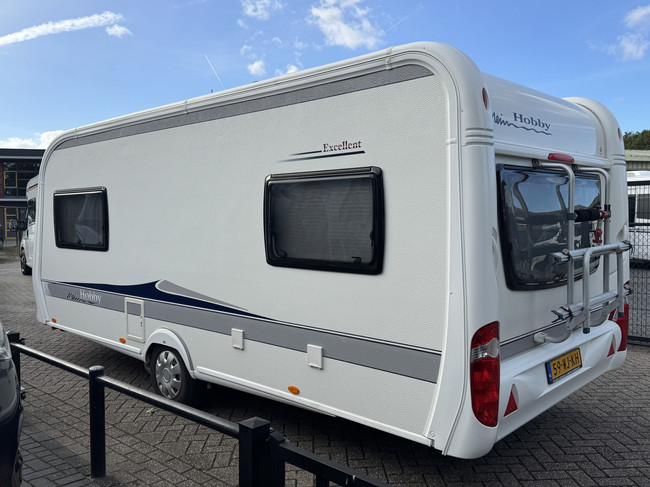 Hobby Excellent 495 UL met ENKELE BEDDEN en grote rondzit **Mover/Reservewiel/XXL Koelkast/Fietsendrager voor & achter/Zeer nette staa foto: 3