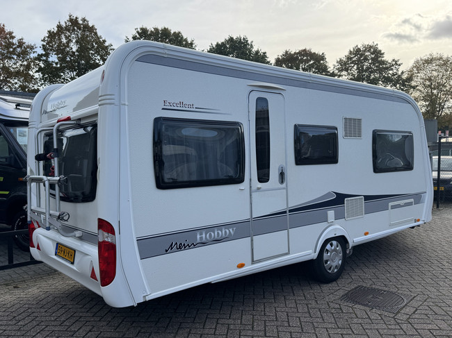 Hobby Excellent 495 UL met ENKELE BEDDEN en grote rondzit **Mover/Reservewiel/XXL Koelkast/Fietsendrager voor & achter/Zeer nette staa foto: 1