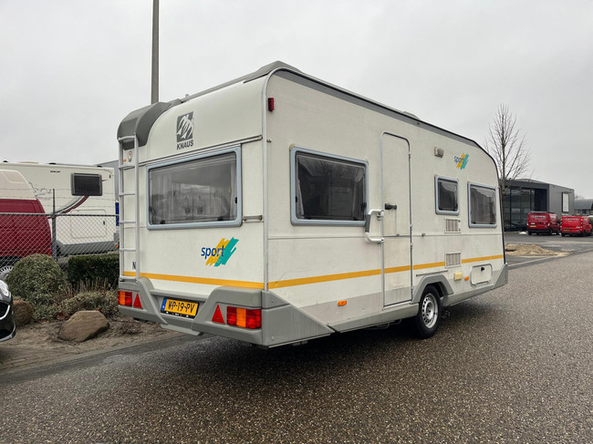 Knaus Sport 2404 | Voortent | Halfautomaat mover | Vastbed | Dinette (rondzit) | Kachel | Casette toilet | Imperiaal/ladder