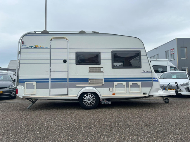 Hobby De Luxe 400 SF | Luifel | Fietsenrek | Mover Half Automaat | Vastbed | Dinette (Treinzit) | Tempo 100 | Schokbrekers