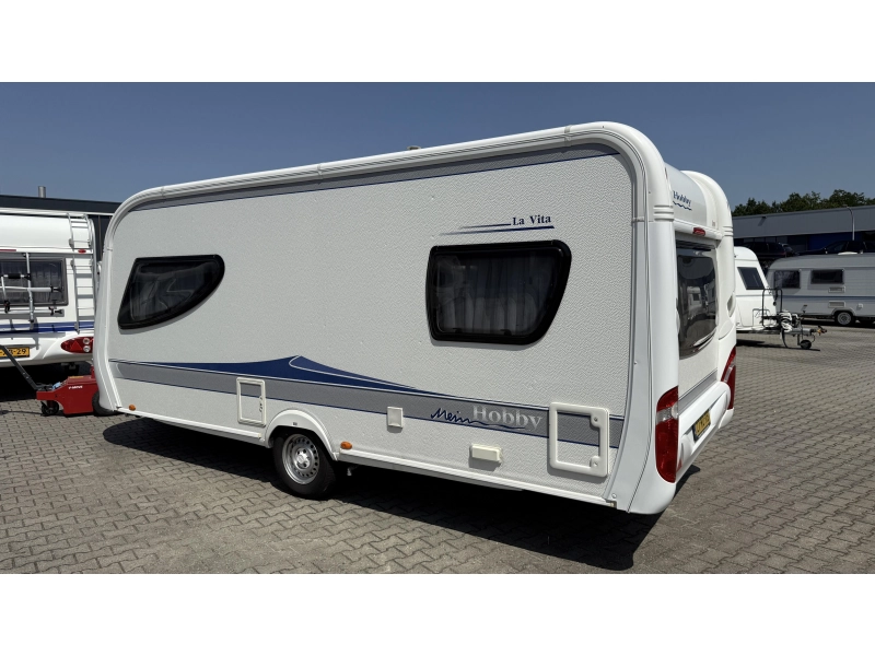 Hobby La Vita Bionda 495 UL enkele bedden rondzit  foto: 12
