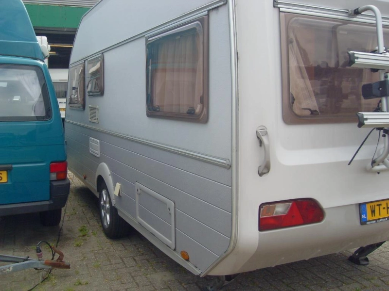 Kip Grey Line 47 TDB met Mover 