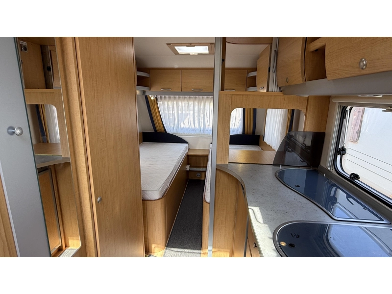 Knaus Sudwind 500 EU enkele bedden rondzit  foto: 11