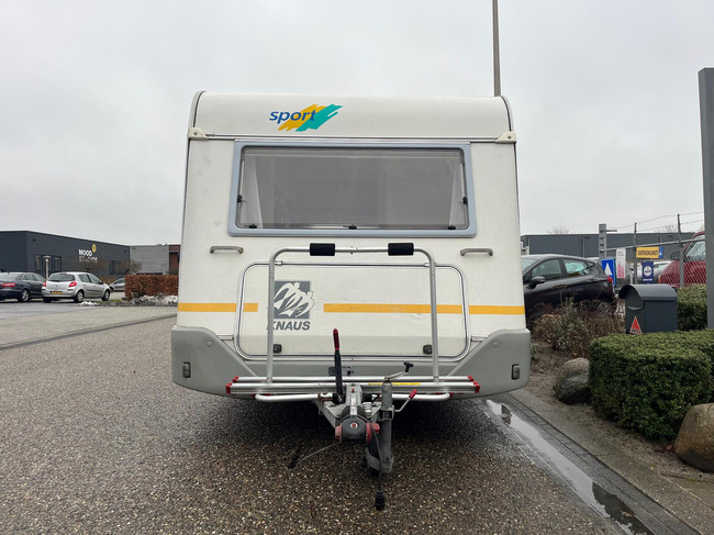 Knaus Sport 2404 | Voortent | Halfautomaat mover | Vastbed | Dinette (rondzit) | Kachel | Casette toilet | Imperiaal/ladder