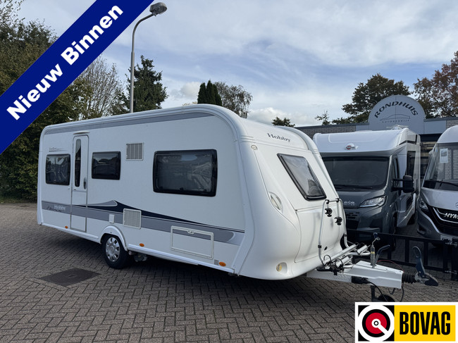Hobby Excellent 495 UL met ENKELE BEDDEN en grote rondzit **Mover/Reservewiel/XXL Koelkast/Fietsendrager voor & achter/Zeer nette staa hoofdfoto: 1
