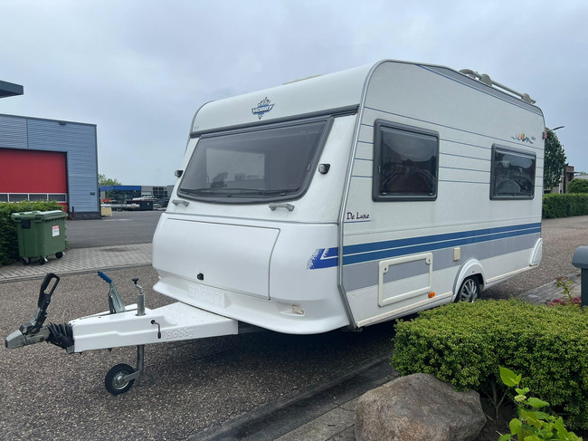 Hobby De Luxe 400 SF | Luifel | Fietsenrek | Mover Half Automaat | Vastbed | Dinette (Treinzit) | Tempo 100 | Schokbrekers foto: 2