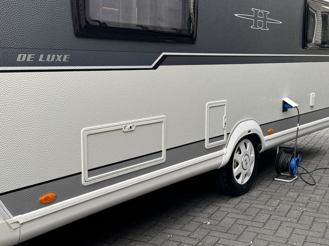 Hobby De Luxe 495 UL met enkele bedden **Mover/Fietsendrager/Zakluifel/Buitengas/2e serviceluik/1e eigenaar/Zeer nette caravan** foto: 13